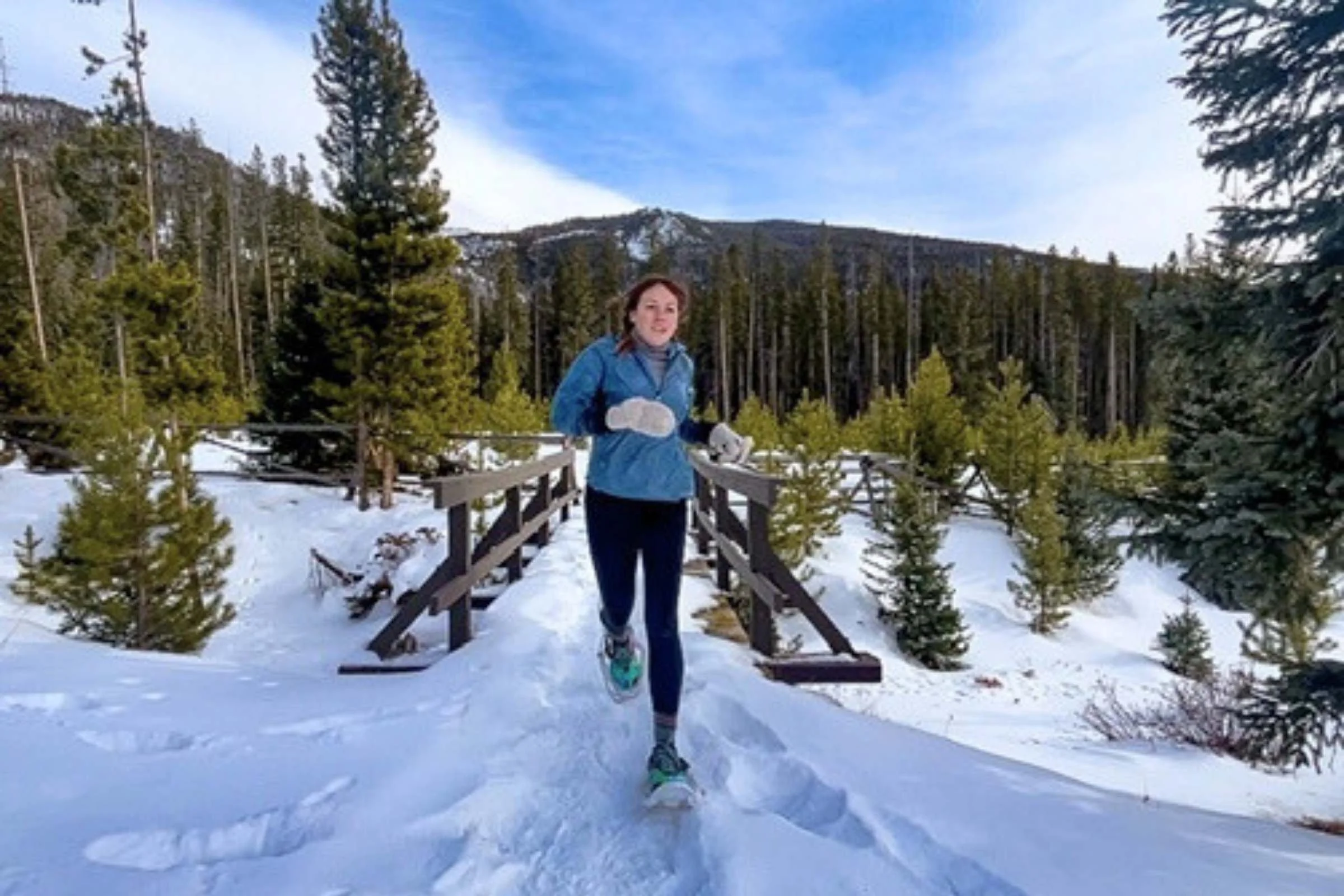 TSL Outdoors Symbioz Racing Snowshoes on a groomed snowy trail.