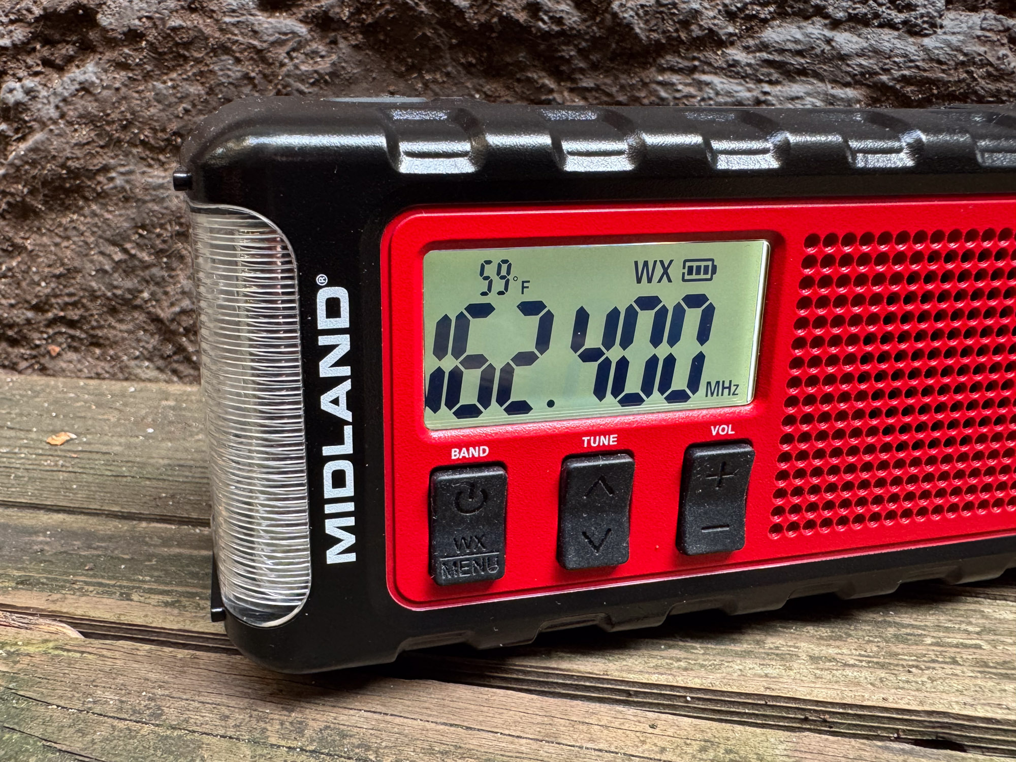 Close-up of the ER310PRO digital display showing a NOAA weather frequency.