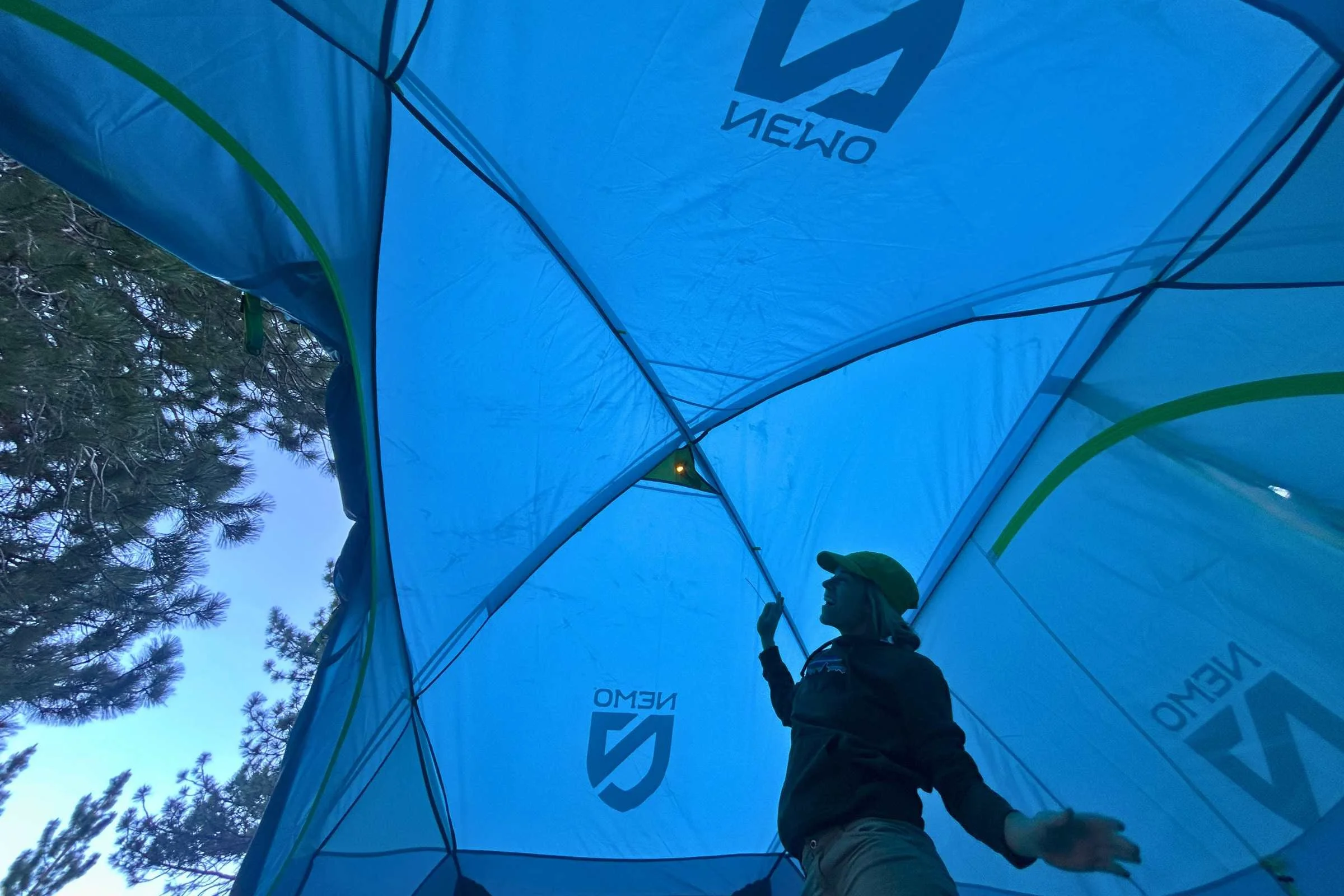 Interior shot of a tall dome tent showcasing the high ceiling and spacious layout.