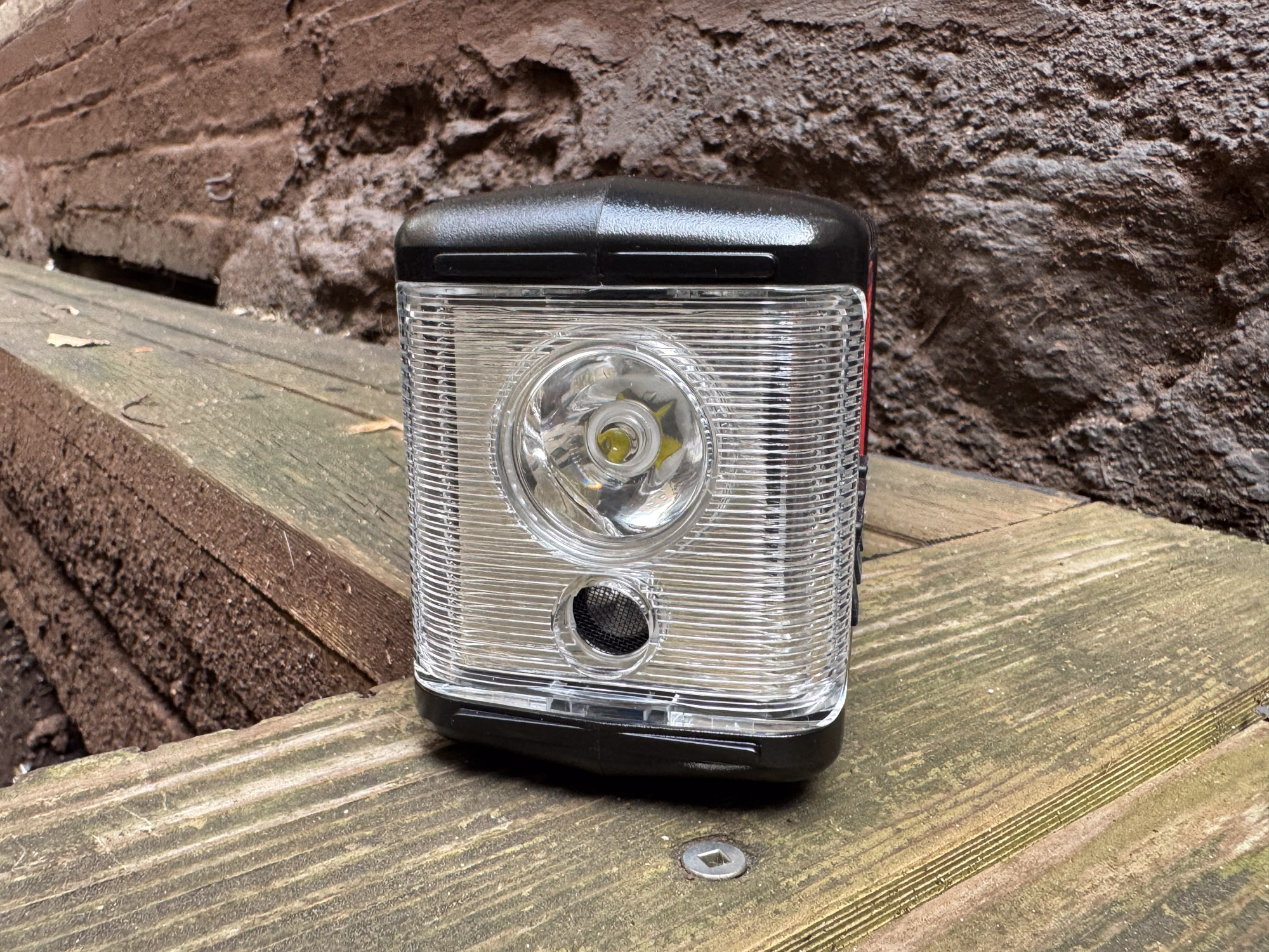 Detail shot of the front-facing Cree LED flashlight and sensor panel on the radio.