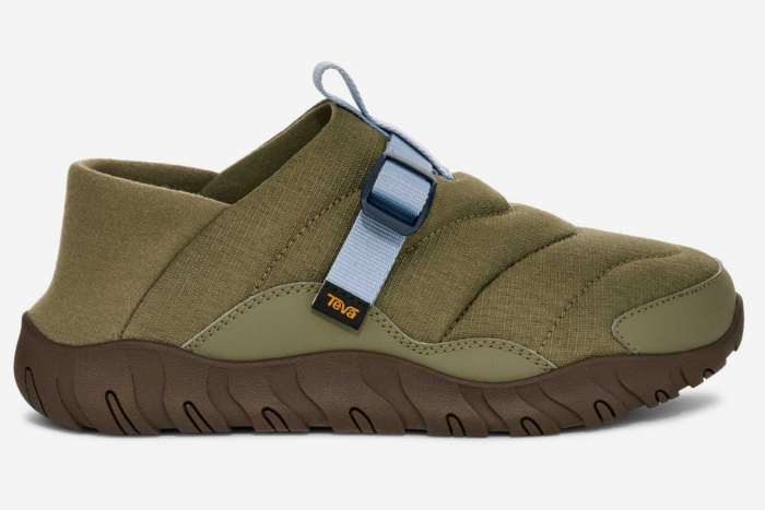 Side profile of a blue Teva ReEmber Slip-On showing the quilted pattern.