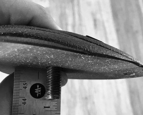 Diagram showing how a climbing hold bolt should properly thread into a T-nut.