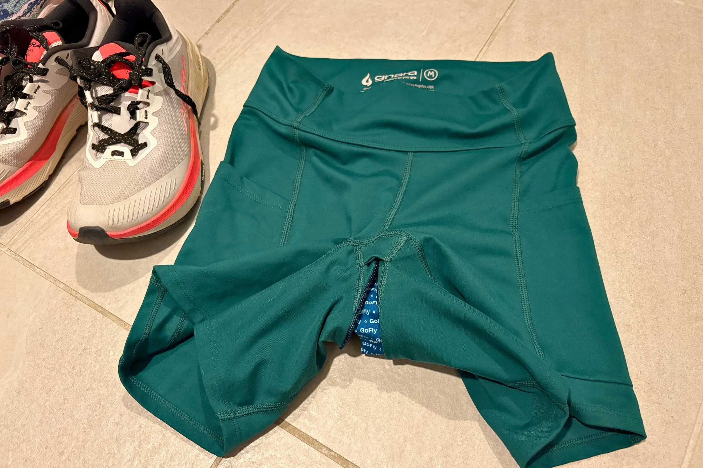 A front view of the Gnara Go Free 6-inch compressive shorts designed for trail running.