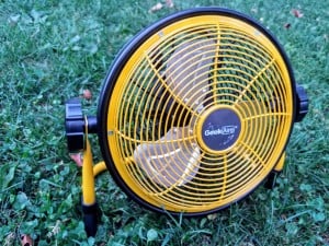Geek Aire Rechargeable Outdoor Floor Fan on a grassy surface.