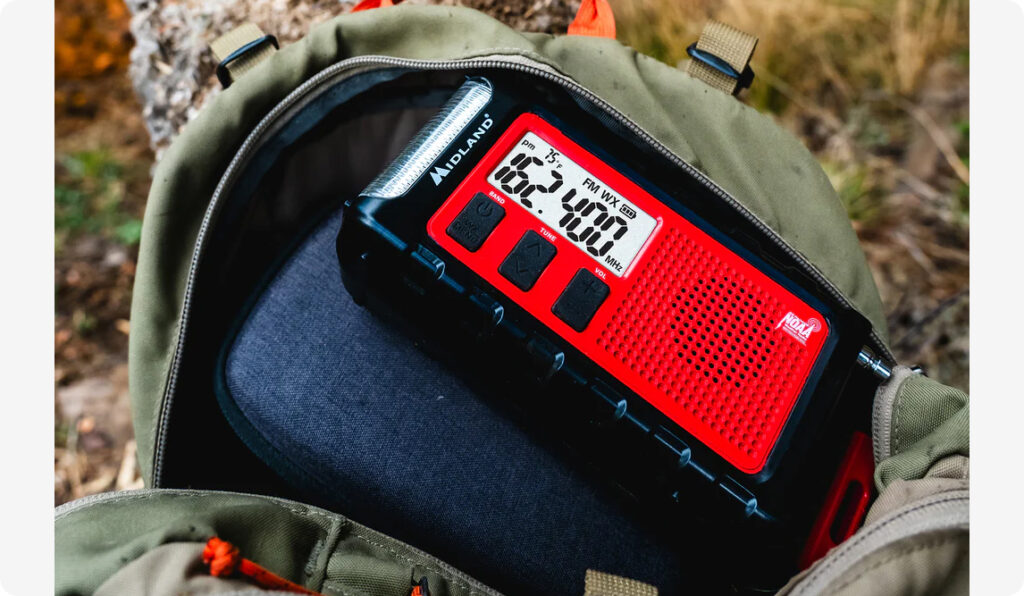 Side profile of the Midland ER310PRO highlighting its molded impact-resistant housing.