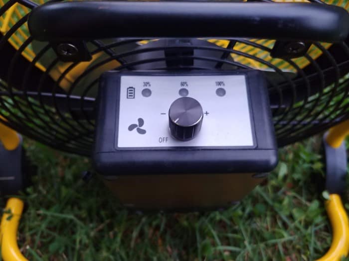 Close-up of the speed control knob and battery indicator on a Geek Aire fan.