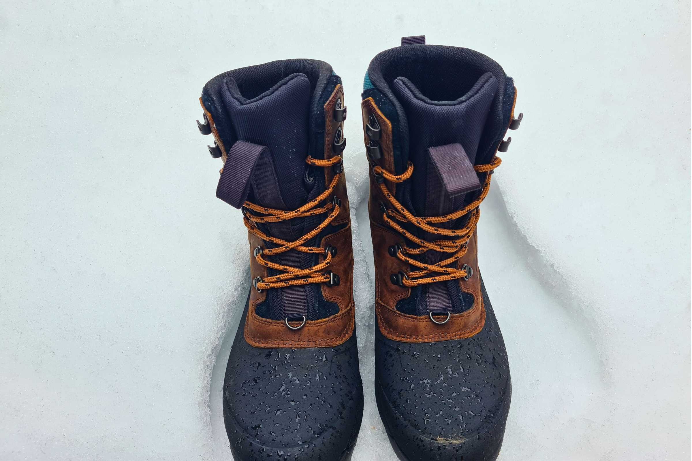 The North Face Chilkat V 400g insulated boot shown in a snowy trail setting.