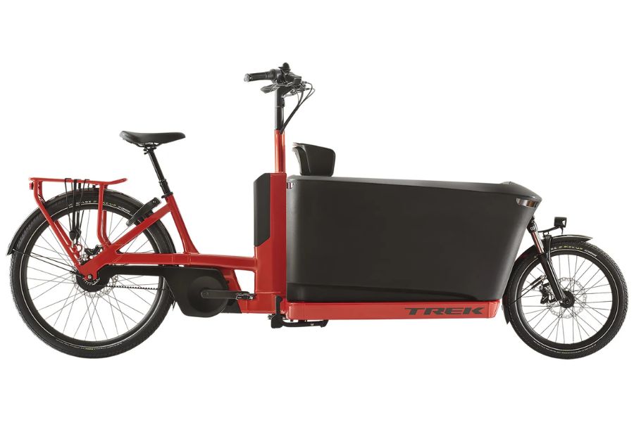 Trek Fetch+ 4 front-loading cargo bike with a large protective box for children.